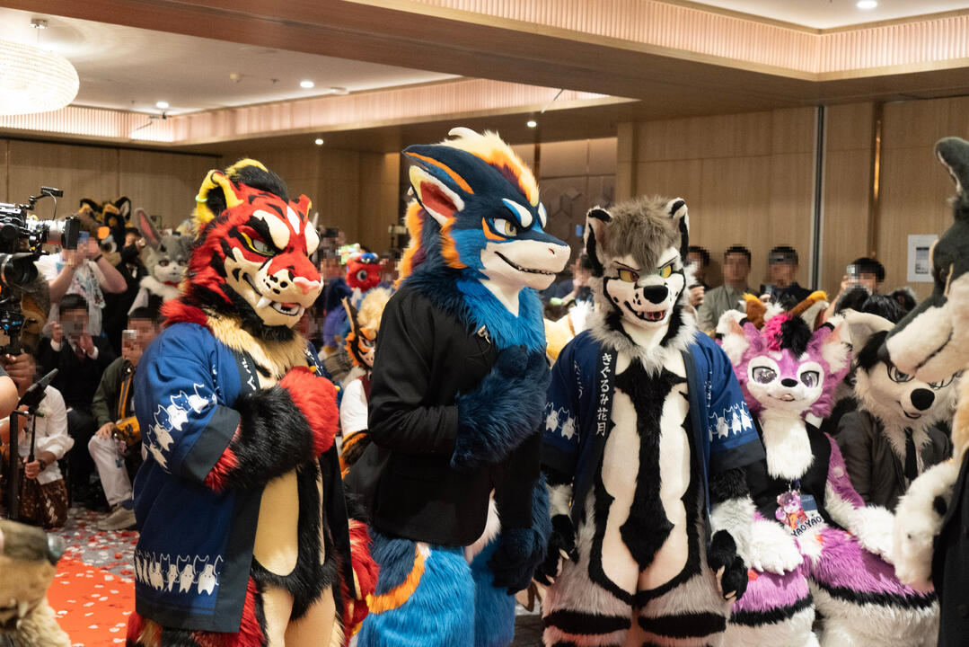 Groom Teryx walks in with his fursuit dads and sings